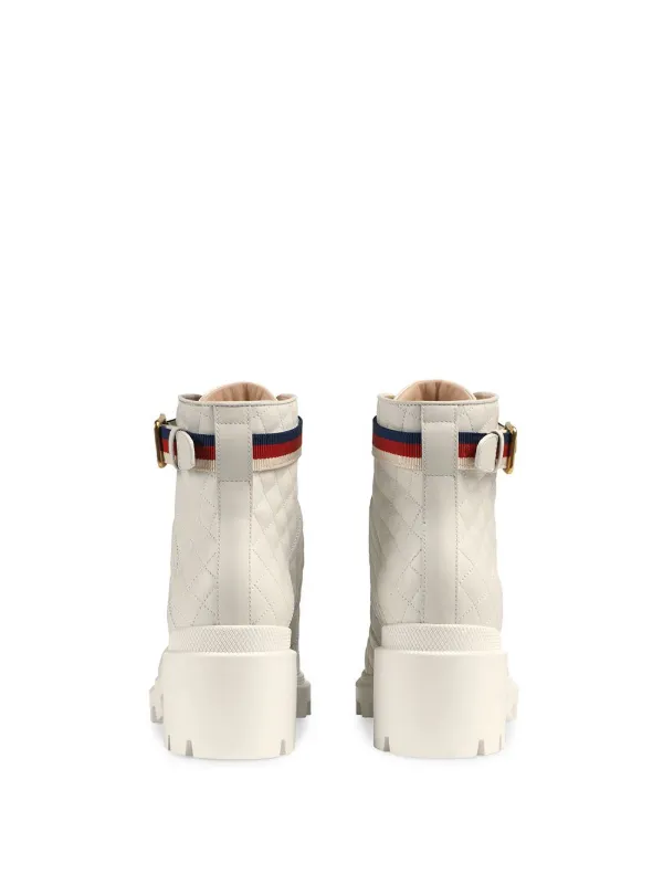 quilted leather ankle boot with belt