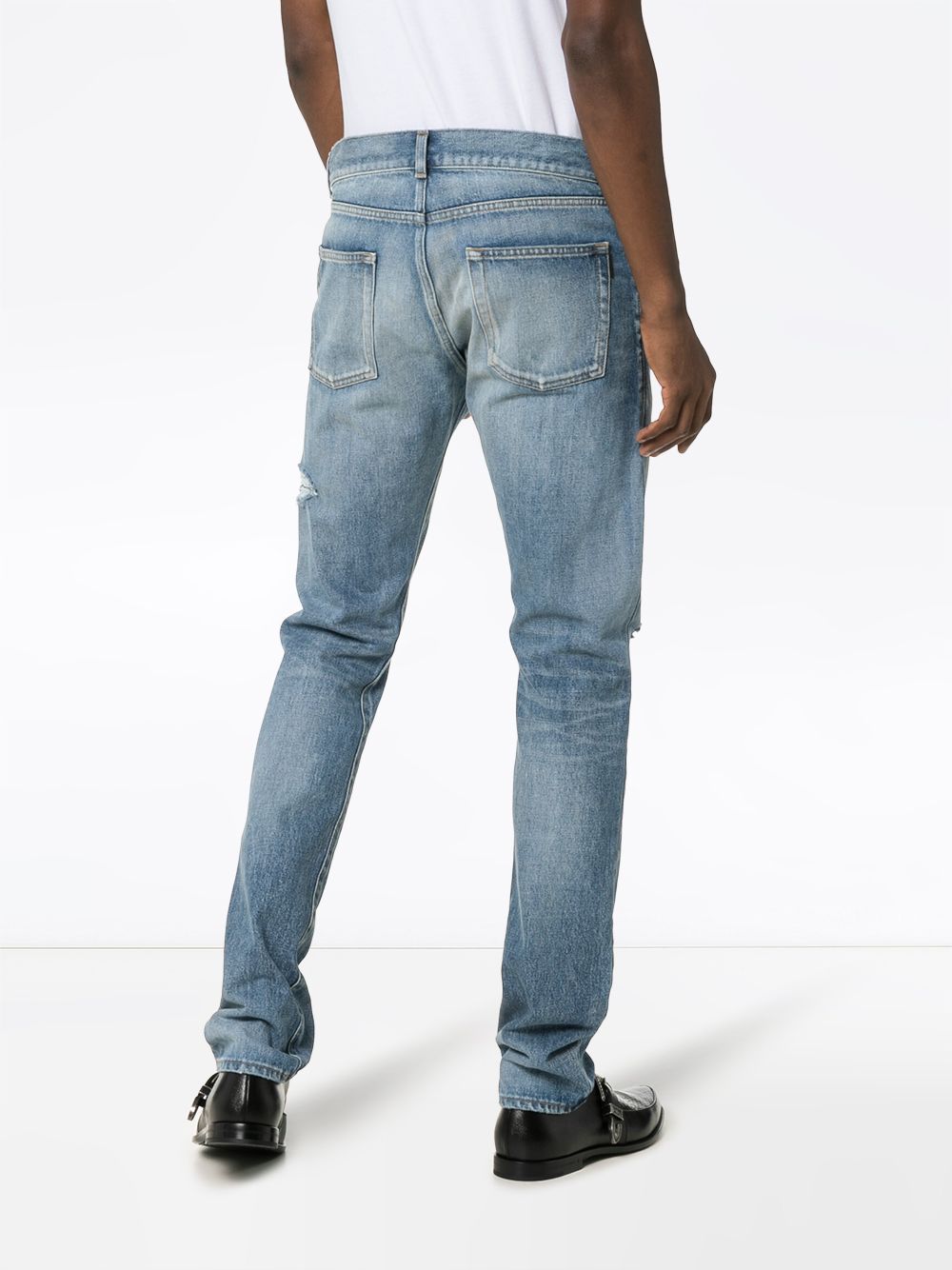 фото Saint Laurent джинсы кроя слим с эффектом потертости