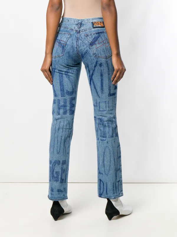 【洋書】Walter Van Beirendonck W&LT Walter Van Beirendonck Pre-Owned Ink Writing Jeans | Blue | FARFETCH