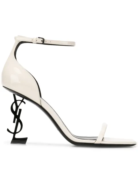 Click to view more detailed imagery on our partner's website Saint Laurent Opyum Sandals In Patent Leather With A Black Heel In White