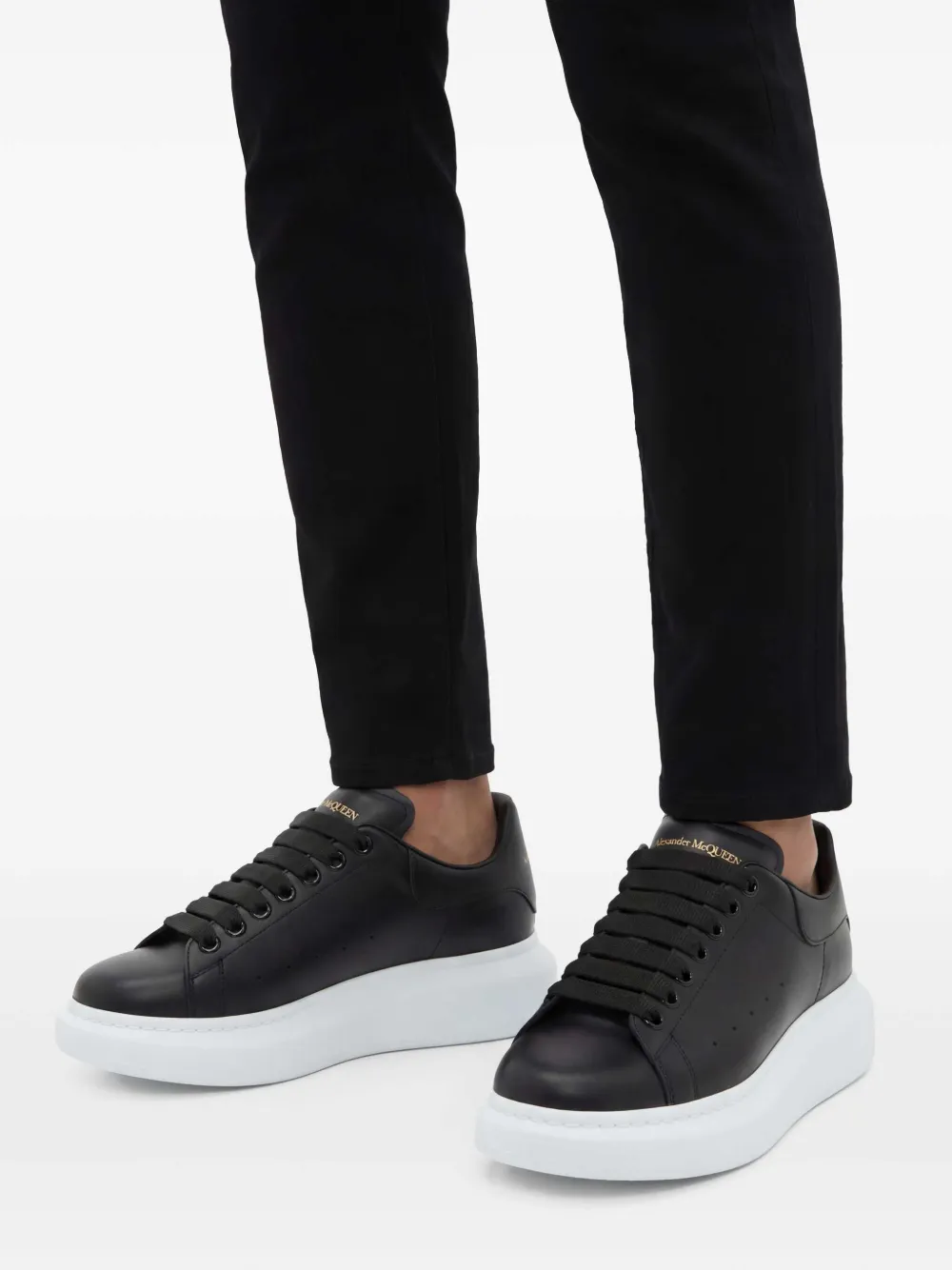Alexander McQueen Oversized low-top Sneakers | Black | FARFETCH CA