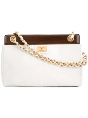 2003-2004 wooden chain shoulder bag by Chanel Pre-Owned, available on farfetch.com for $6771 Ivanka Trump Bags SIMILAR PRODUCT