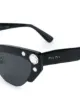Miu Miu Eyewear نظارة شمسية إس إم يو 04 يو
