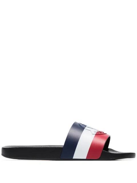 Click to view more detailed imagery on our partner's website Moncler Logo-embossed Striped Rubber Slides In Black