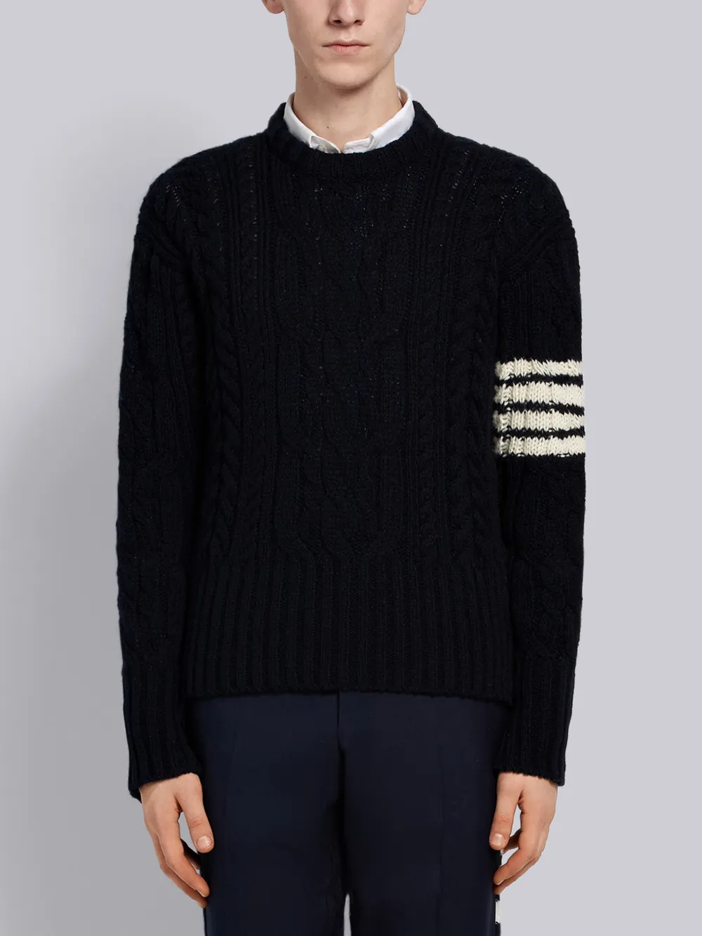 Click to view more detailed imagery on our partner's website Thom Browne 4-Bar Aran Cable Pullover In Blue
