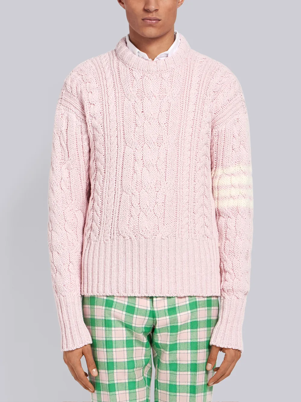 Click to view more detailed imagery on our partner's website Thom Browne 4Bar Aran Cable Pullover In Pink