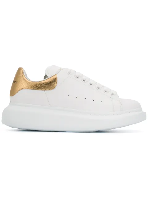Click to view more detailed imagery on our partner's website Alexander Mcqueen Metallic-Trimmed Leather Exaggerated-Sole Sneakers In White