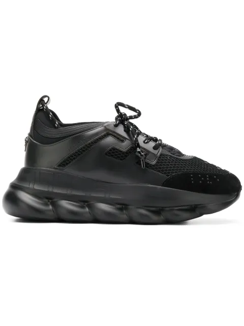 Click to view more detailed imagery on our partner's website Versace Chain Reaction Leather And Mesh Trainers In D41 Black