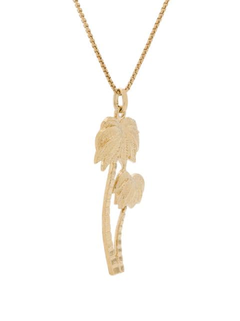 Shop Saint Laurent Palm Tree Pendant Necklace In Gold