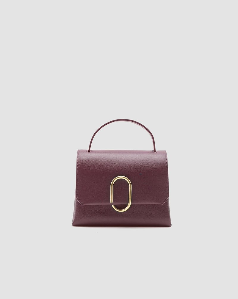 Alix Mini Top Handle Satchel-red #0 Alix Mini Top Handle Satchel, Bordeaux red calf leather Alix mini top handle satchel bag from 3.1 Phillip Lim featuring single top handle, adjustable detachable shoulder strap, foldover top, gold-tone hardware, partitioned compartment and internal slip pocket.- 0
