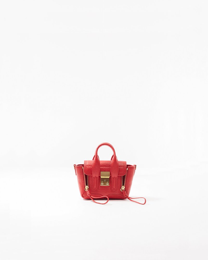 Pashli Nano Satchel-red #0 Pashli Nano Satchel, Red Calf Leather Pashli nano satchel from 3.1 Phillip Lim featuring two rounded top handles, adjustable detachable shoulder strap, gold-tone clasp fastening, main compartment, internal card slots and zip details.- 0