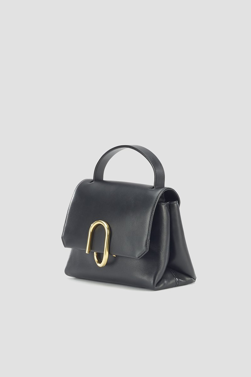 mini Alix satchel bag-black #1 mini Alix satchel bag, mini Alix satchel bag from 3.1 Phillip Lim featuring black, calf leather, cotton blend, silver-tone logo plaque, foldover top, detachable shoulder strap, single rounded top handle, multiple internal slip pockets and partitioned compartment.- 1