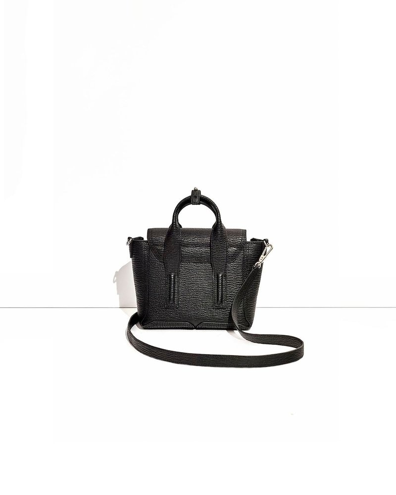 Pashli Mini Satchel, Black calf leather Pashli mini satchel bag from 3.1 Phillip Lim featuring two rounded top handles, adjustable detachable shoulder strap, silver-tone clasp fastening, main compartment, internal zip pocket and zip details.- 1