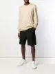 الصورة 2 من Maison Margiela كنزة بلمسات ممزقة