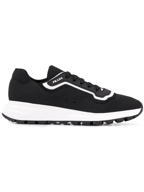 Click to view more detailed imagery on our partner's website Prada Grey Gabardine Leather Low Top Sneakers In F0967 Nero/bianco