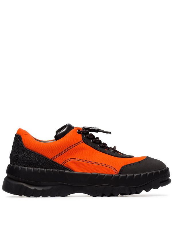 orange and black sneakers