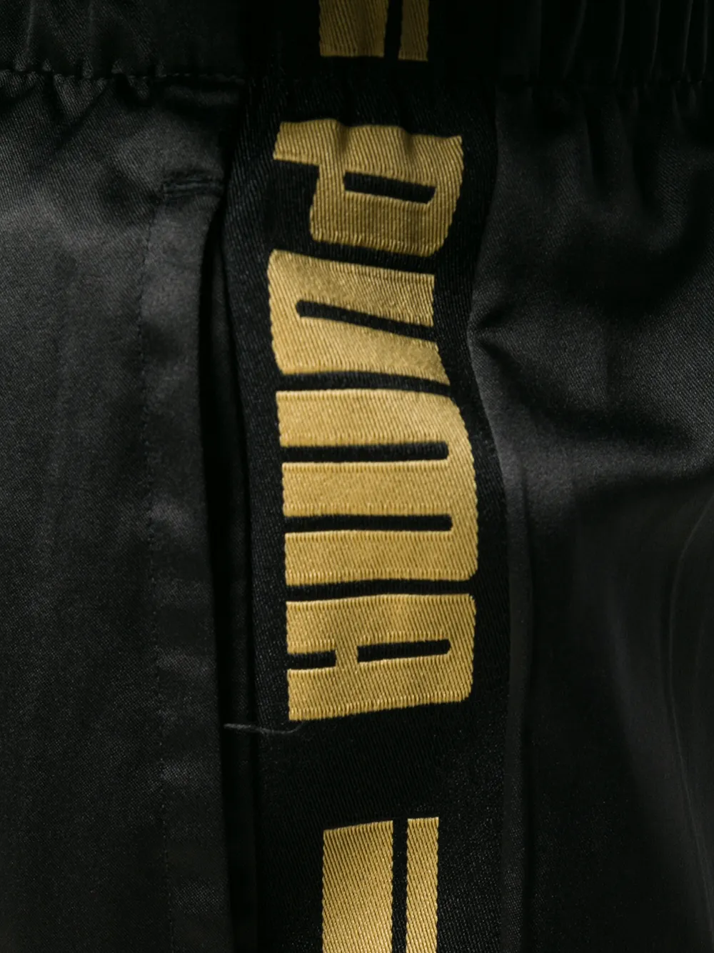 PUMA Trainingsbroek met zijstreep Zwart