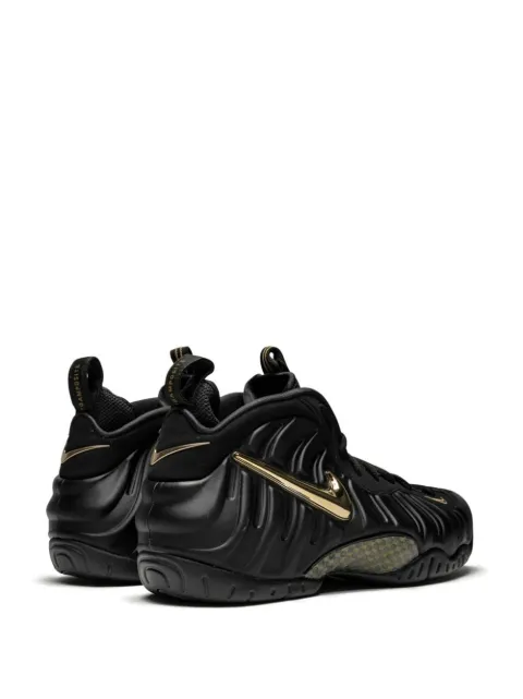 nike air foamposite black and gold