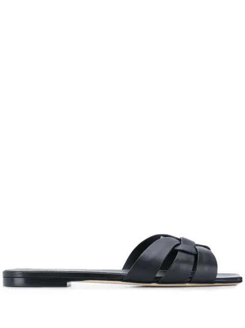 Click to view more detailed imagery on our partner's website Saint Laurent Tribute Flat Crackled Leather Slide Sandals In Black