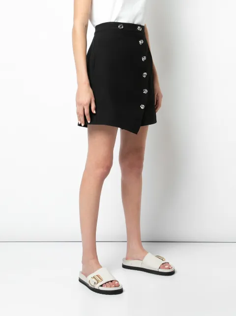 white satin crop top and skirt