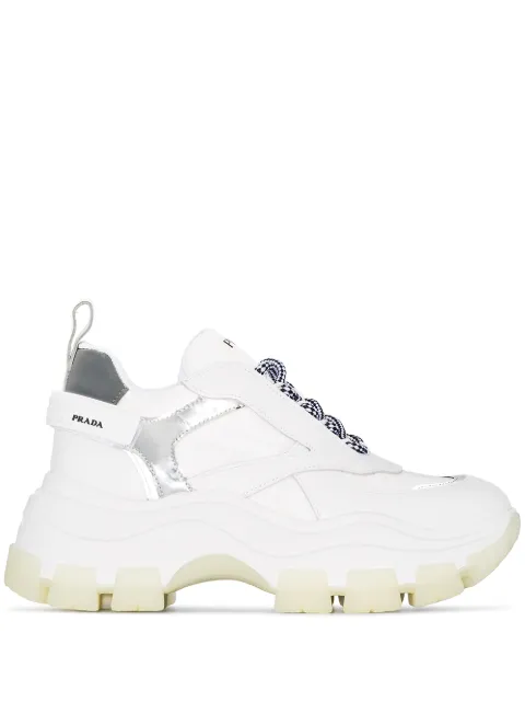 Click to view more detailed imagery on our partner's website Prada Pegasus Metallic-Paneled Leather And Canvas Sneakers In Bianco + Argento