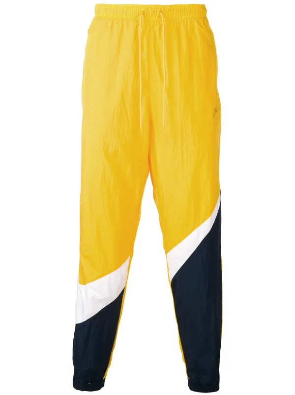 nike yellow track pants