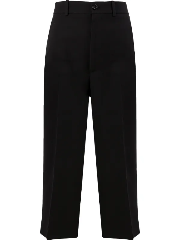 black pleated cropped trousers