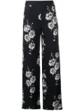 McQ Swallow floral printed trousers - Black