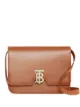 الصورة 1 من Burberry حقيبة متوسطة بشعار TB