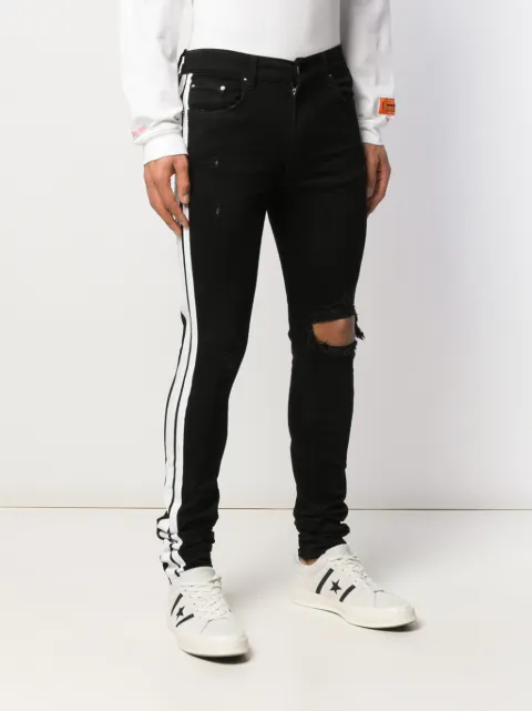 amiri broken track jeans
