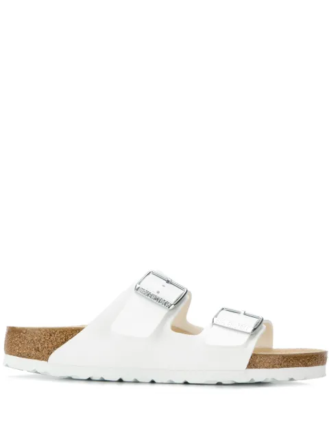 Click to view more detailed imagery on our partner's website Birkenstock Arizona White Birko Flor Narrow Fit Flat Sandals - White In White Synthetic Leather
