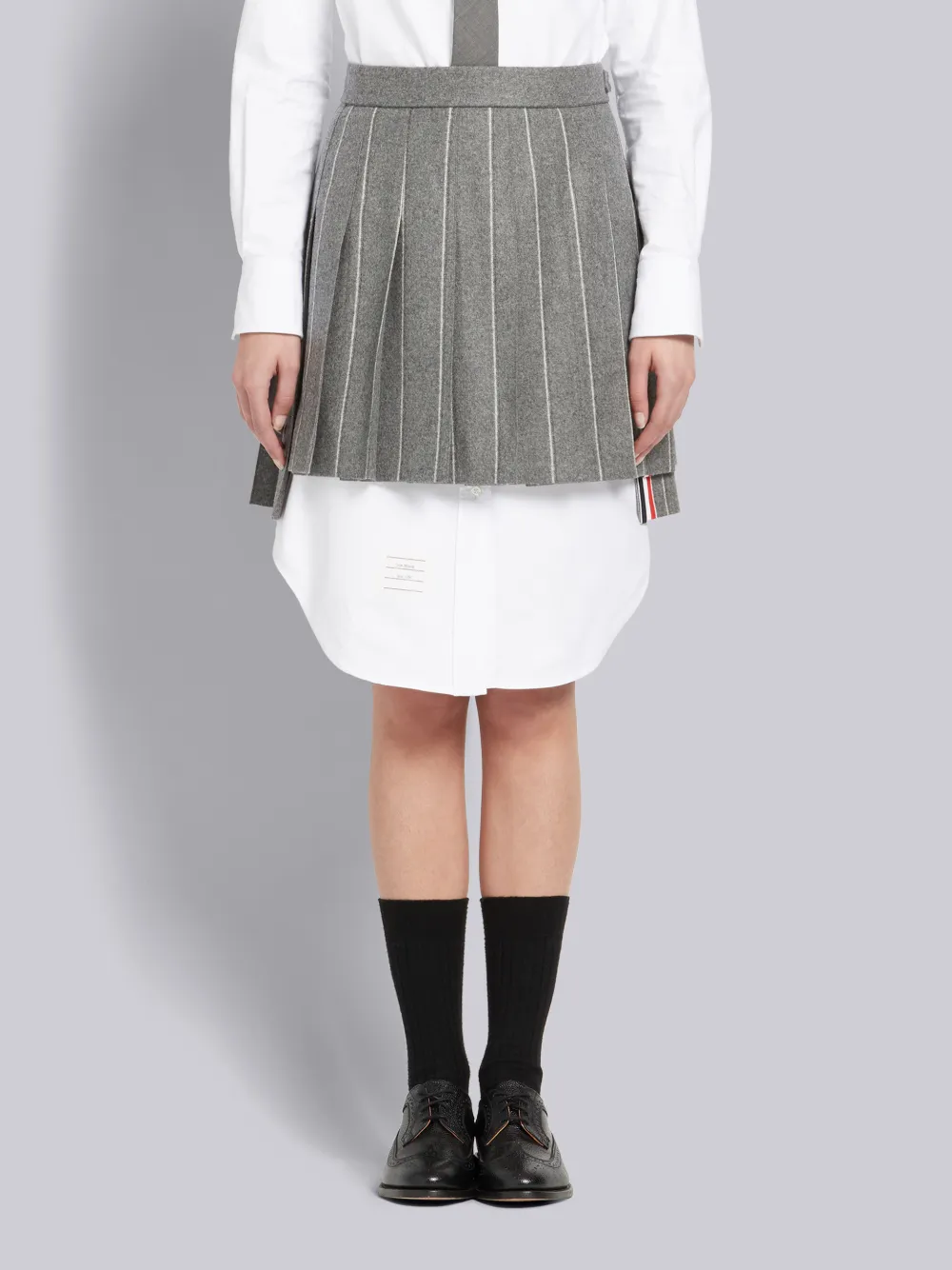 Click to view more detailed imagery on our partner's website Thom Browne Shadow Stripe Flannel Miniskirt In Grey