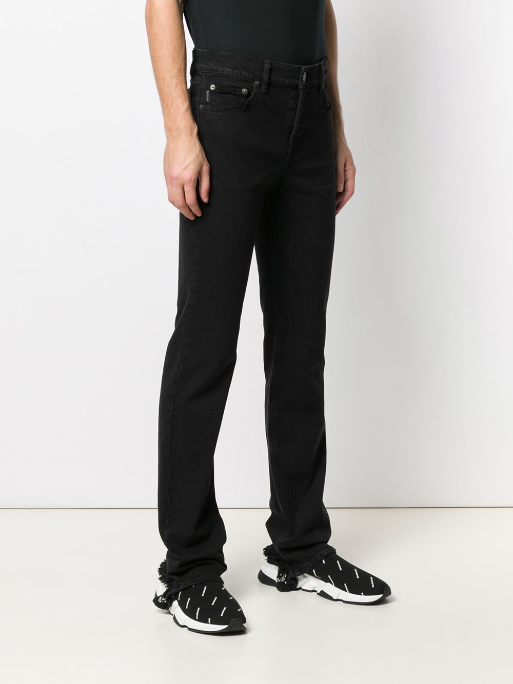 Shop Balenciaga Distressed-effect Fitted Jeans In Black