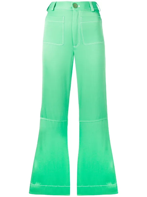 green flared trousers