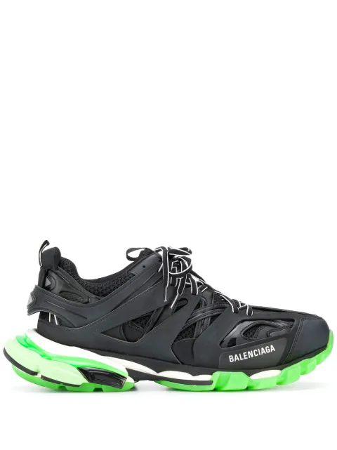 Click to view more detailed imagery on our partner's website Balenciaga Track Glow Nylon, Mesh And Rubber Sneakers In 1003 Black Glow