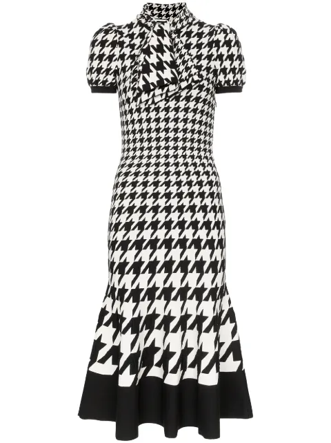 Click to view more detailed imagery on our partner's website Alexander Mcqueen Houndstooth-Jacquard Pussy-Bow Knitted Dress In Black