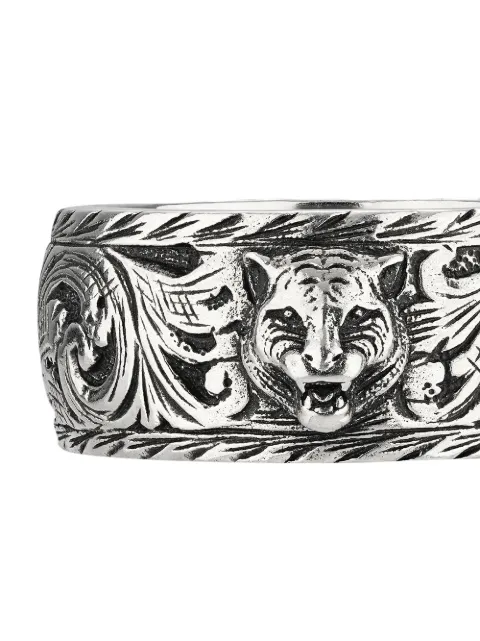 thin silver ring with feline head