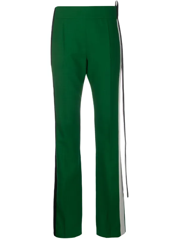 black pants with green side stripe