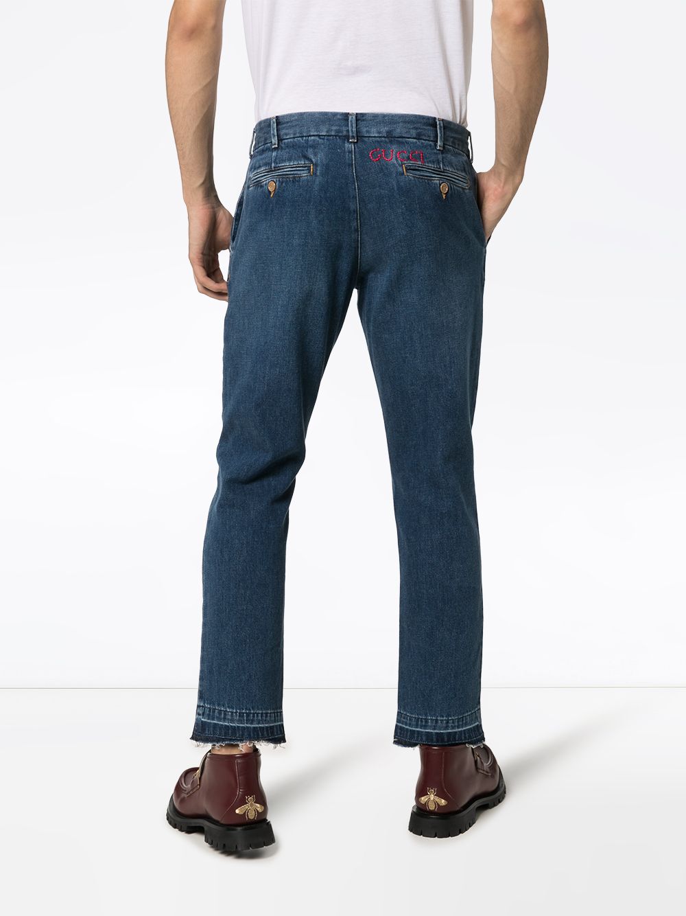 фото Gucci зауженные джинсы с вышитым логотипом