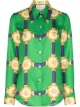 الصورة 1 من Gucci قميص بطبعة أحزمة وشعار GG