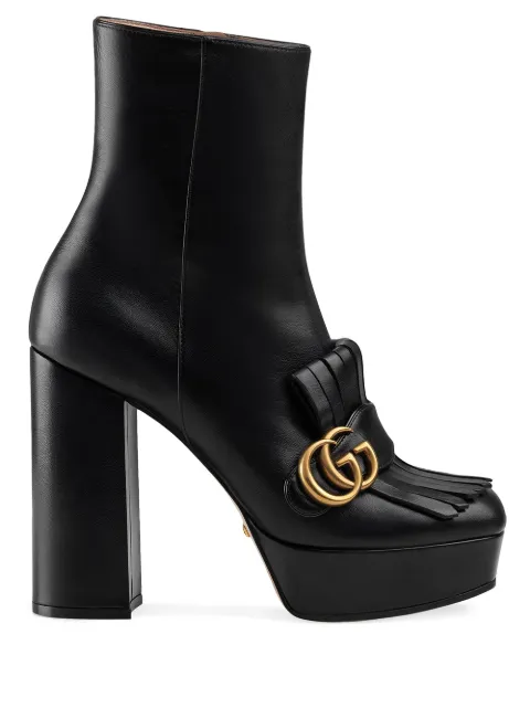 Click to view more detailed imagery on our partner's website Gucci Leather Ankle Boot With Plateau And Fringe In Black