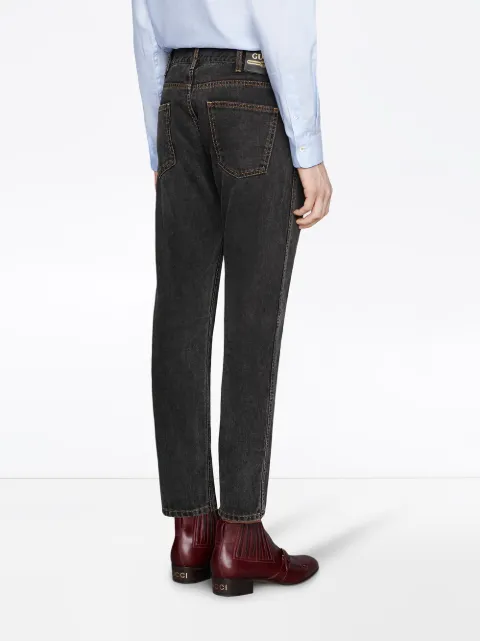 GUCCI GUCCI SCHMALE JEANS MIT STICKEREI - SCHWARZ