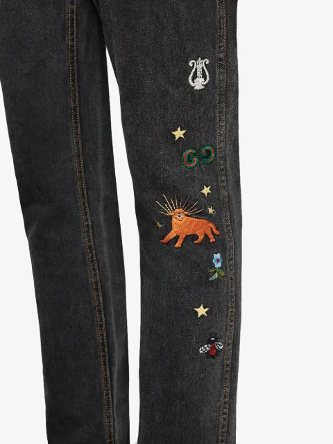 GUCCI GUCCI SCHMALE JEANS MIT STICKEREI - SCHWARZ