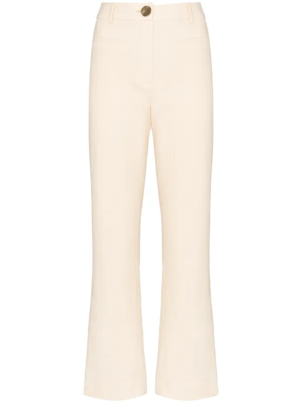 white kick flare trousers