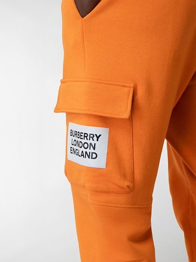 Burberry logo patch track pants orange | MODES