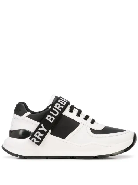 Click to view more detailed imagery on our partner's website Burberry Leather And Fabric Black And White Sneakers With Logo Print