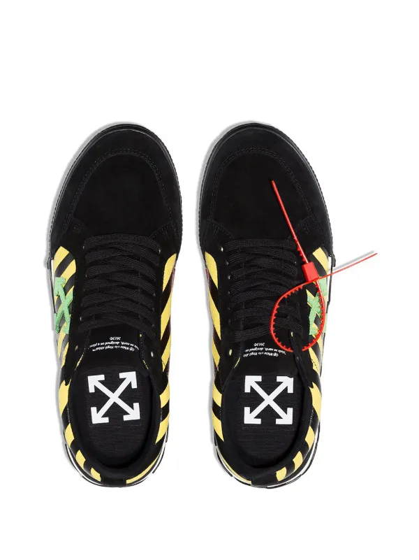 sneakers with arrow logo