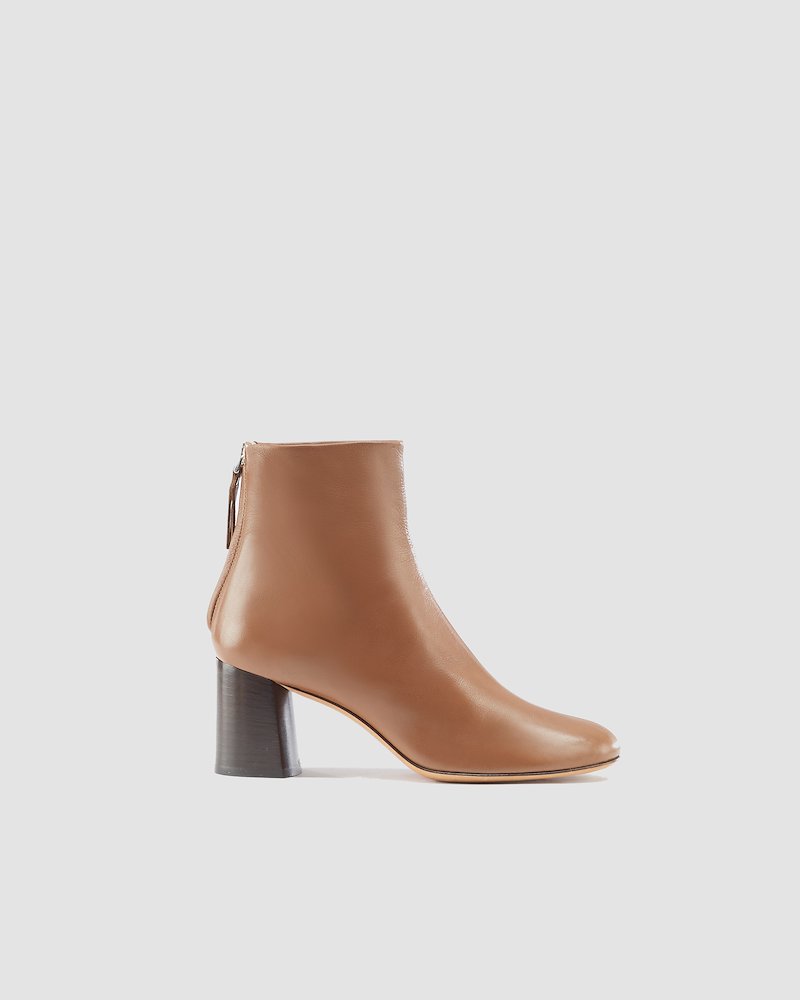 Nadia Soft Heel Boot-brown #0 Nadia Soft Heel Boot, 3.1 Phillip Lim is all about sophisticated minimalism and modern designs that showcase the brand’s contemporary and fashionable nature. As seen in these brown calf leather Nadia Soft Heel Boots that feature a back zip fastening and a mid high block heel. - 0