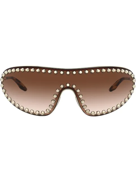Click to view more detailed imagery on our partner's website Prada 170Mm Studded Gradient Wraparound Shield Sunglasses - Pale Gold/ Brown Gradient In 5086S1 Pale Gold