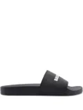 Balenciaga logo-embossed pool slides - Black